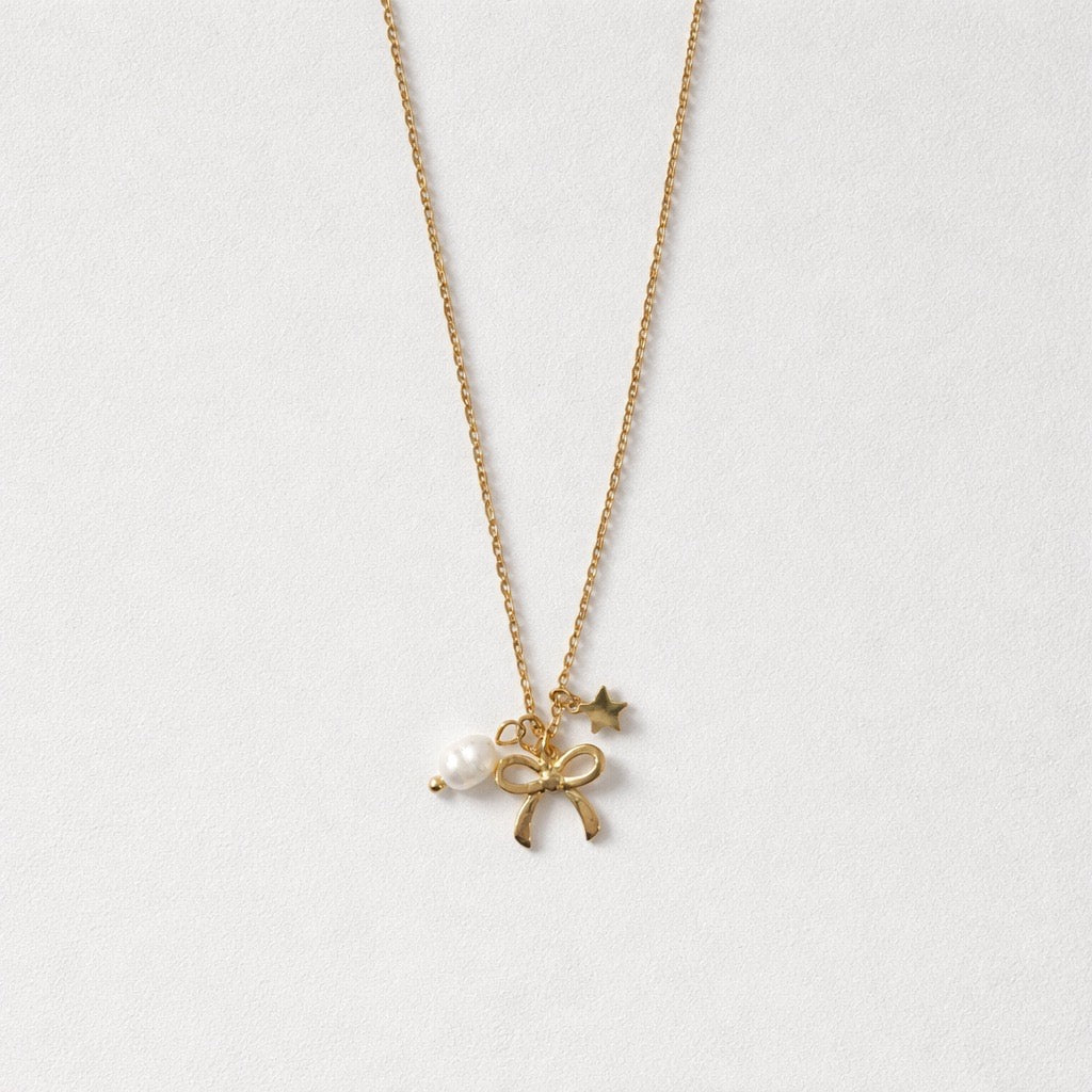 Collana perle fiocchino