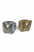 Bracciale rigido acciaio doppia conchiglia