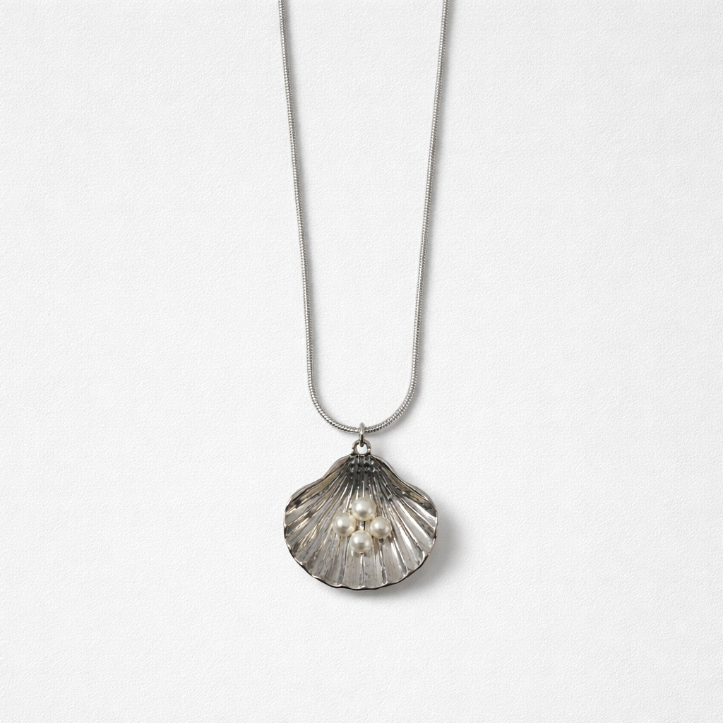 Collana perle conchiglia