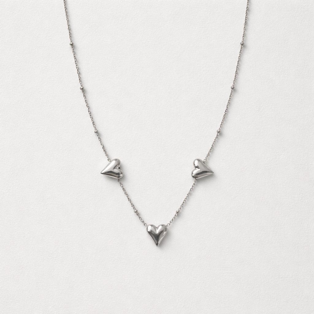 Collana regolabile acciaio tris cuori