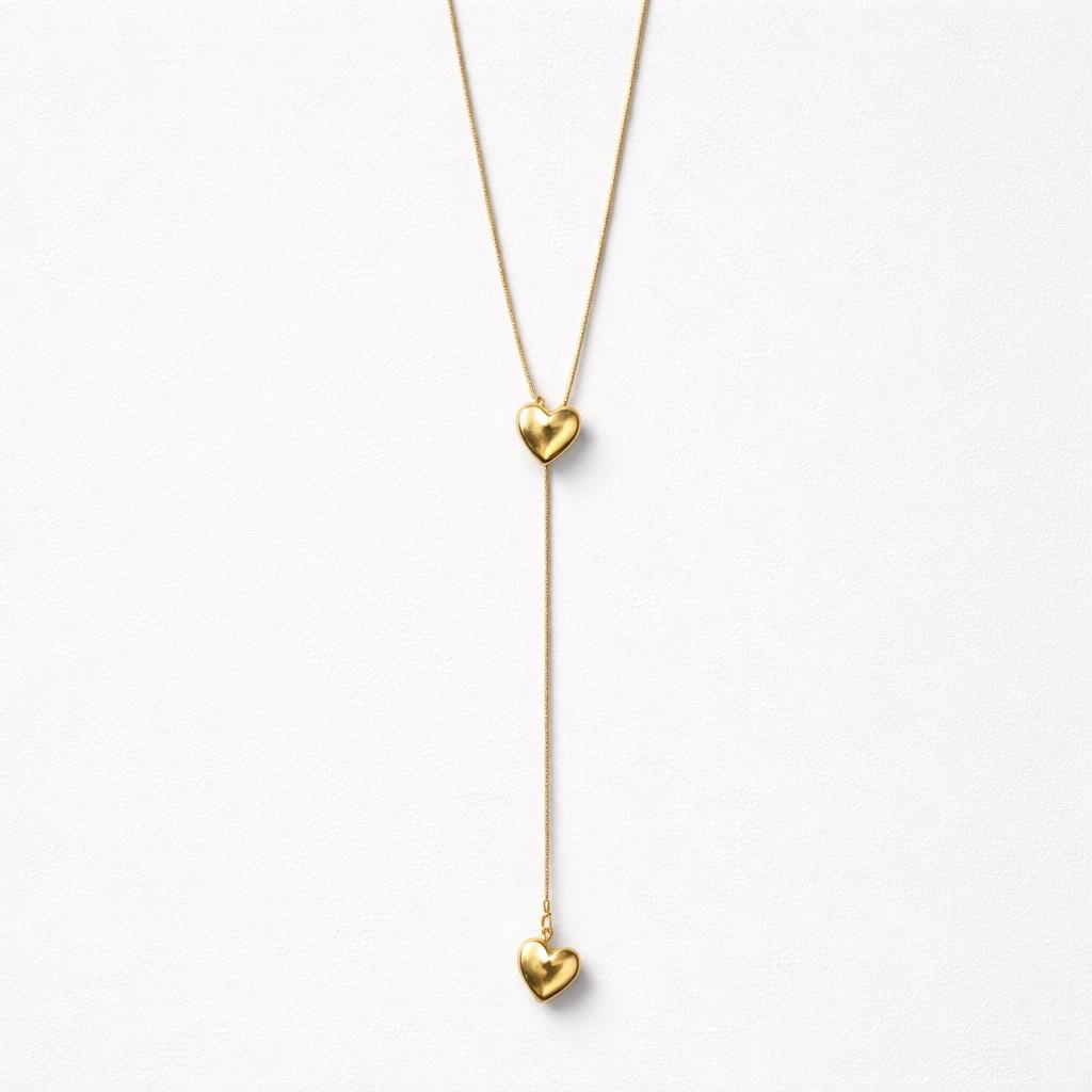 Collana lunga cuoricini acciaio