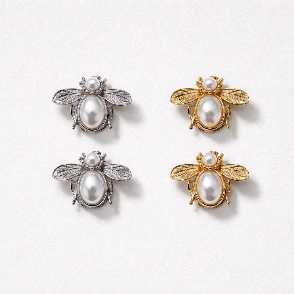 Copribottone coppia metallo strass perla