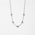Collana regolabile acciaio mini navette zirconi