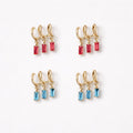 Orecchini cerchi tripla baguette