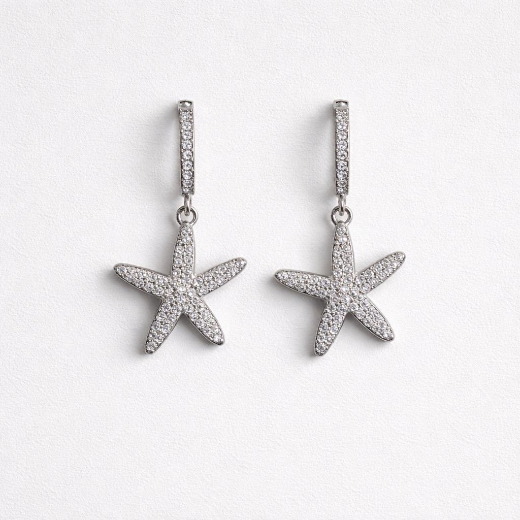 Orecchini cerchi acciaio stella marina strass