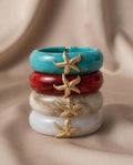 Bracciale rigido resina molla con stella marina