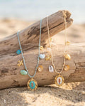Collana regolabile cordino acciaio charms pesci vetro