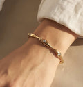 Bracciale regolabile acciaio pesci