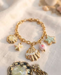 Bracciale regolabile acciaio conchiglia smaltata
