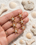 Orecchini pendenti stelline marine strass