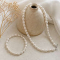 Collana perle fiume acciaio