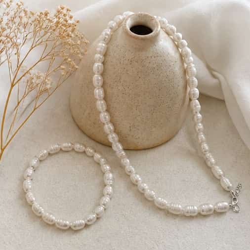 Collana perle fiume acciaio