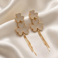 Orecchini pendenti metallo fiori strass