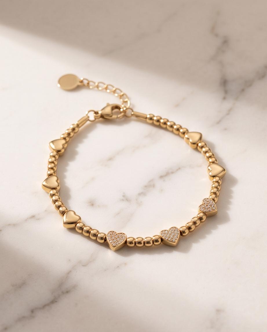 Bracciale regolabile acciaio palline e cuori strass
