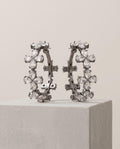 Orecchini cerchi acciaio fiori strass
