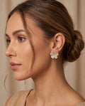 Orecchini lobo metallo fiore strass