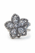 Anello acciaio fiore strass girevole