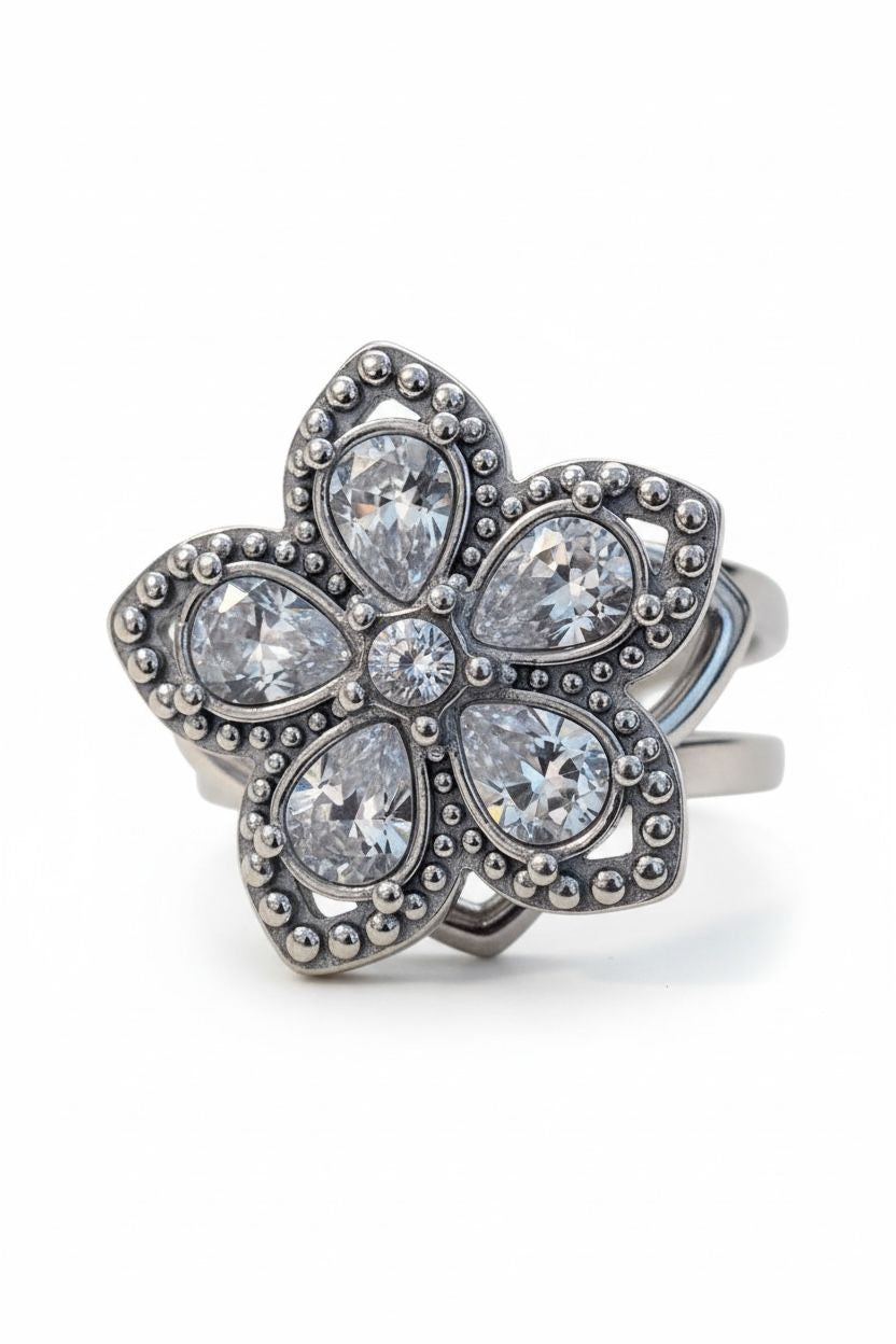 Anello acciaio fiore strass girevole